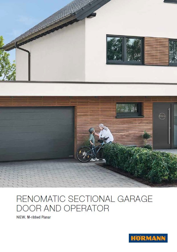 Elegant sectional garage door and operator from Hormann in black color.